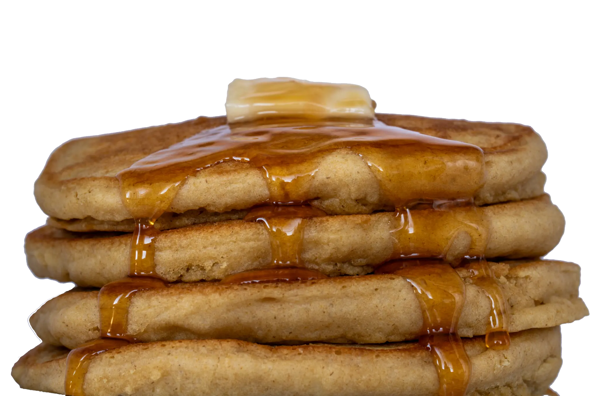 Stack of golden pancakes with butter and maple syrup made with Genell Asil Premium Pancake & Waffle Mix